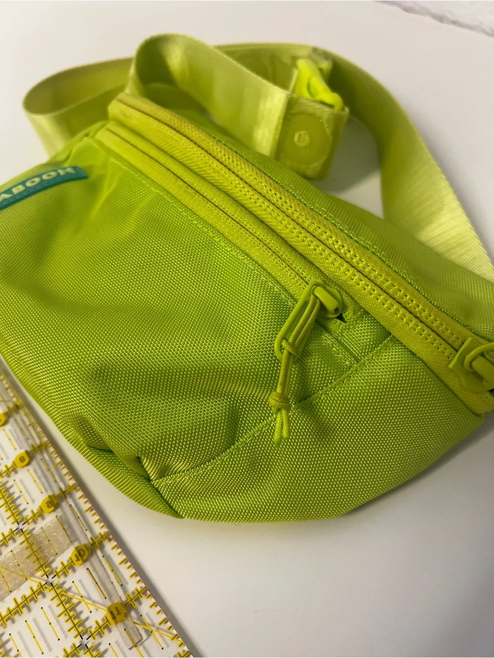 Baboon to the Moon Neon Green Waist Bag and Pink Mini Backpack Bag Duo